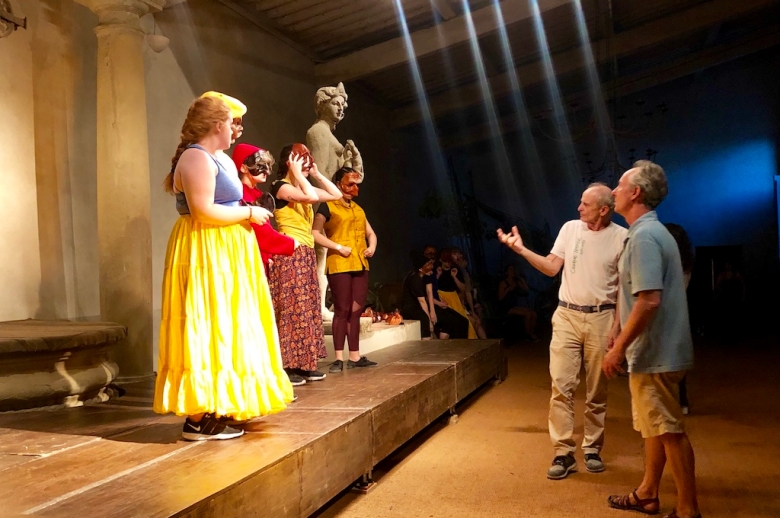 Jim Calder and Jacob Olesen directing actors on stage.